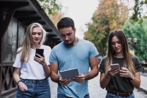 group of people looking at datacultr's device locking technology which is an alternative to payjoy