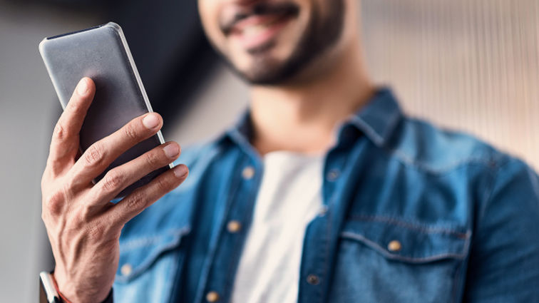 man holding smartphone