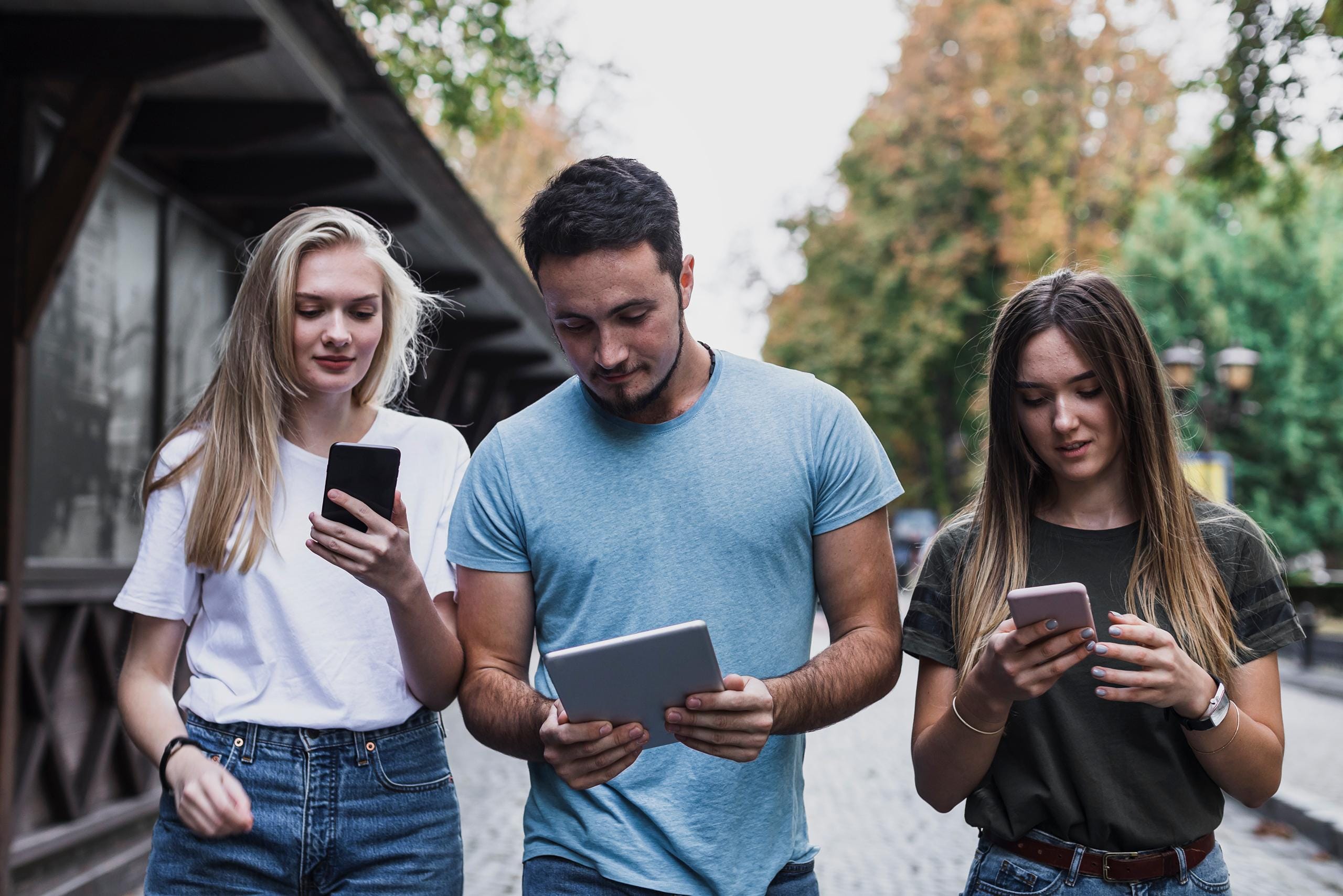 group of people looking at datacultr's device locking technology which is an alternative to payjoy