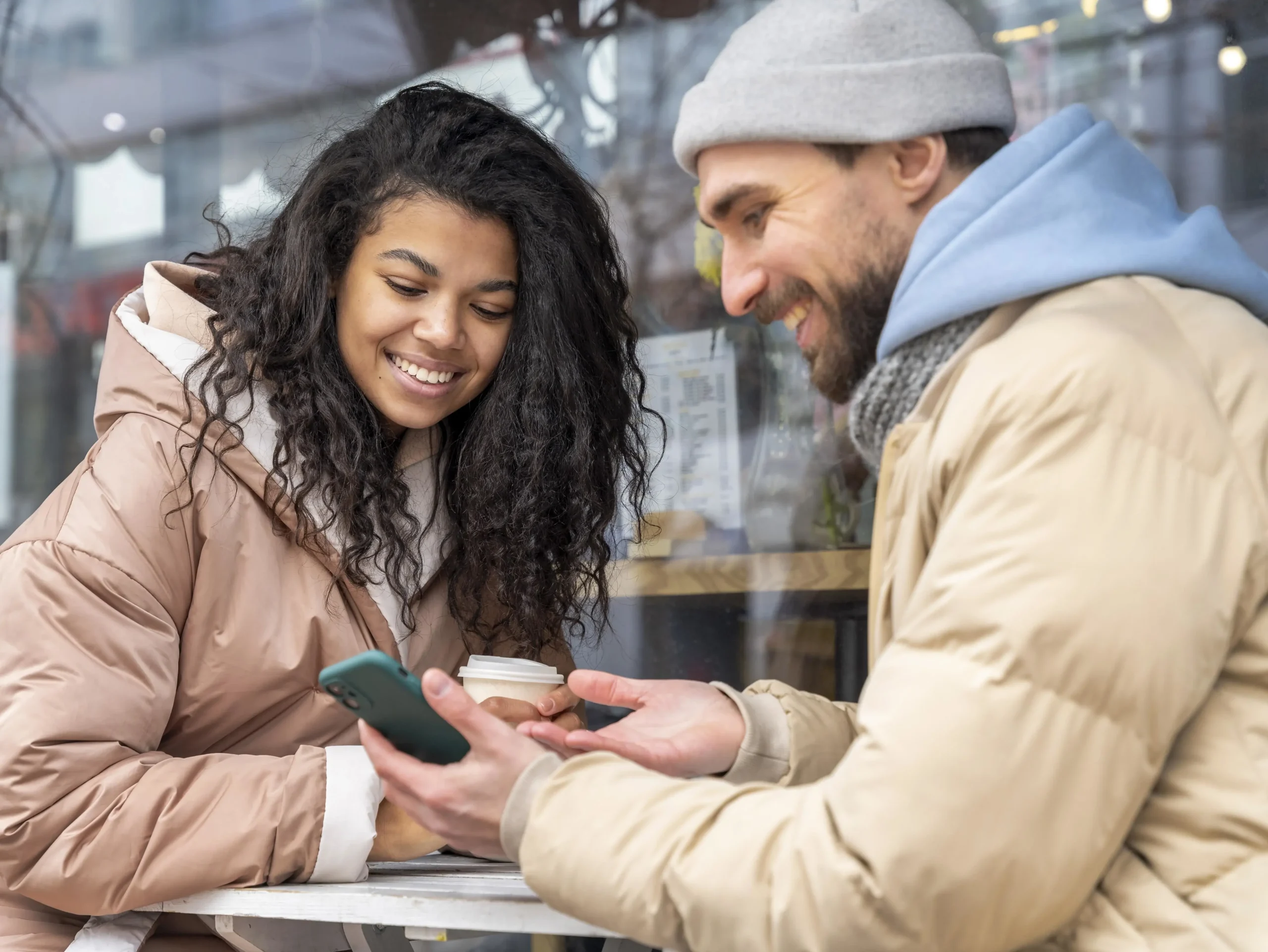close-up-people-looking-smartphone