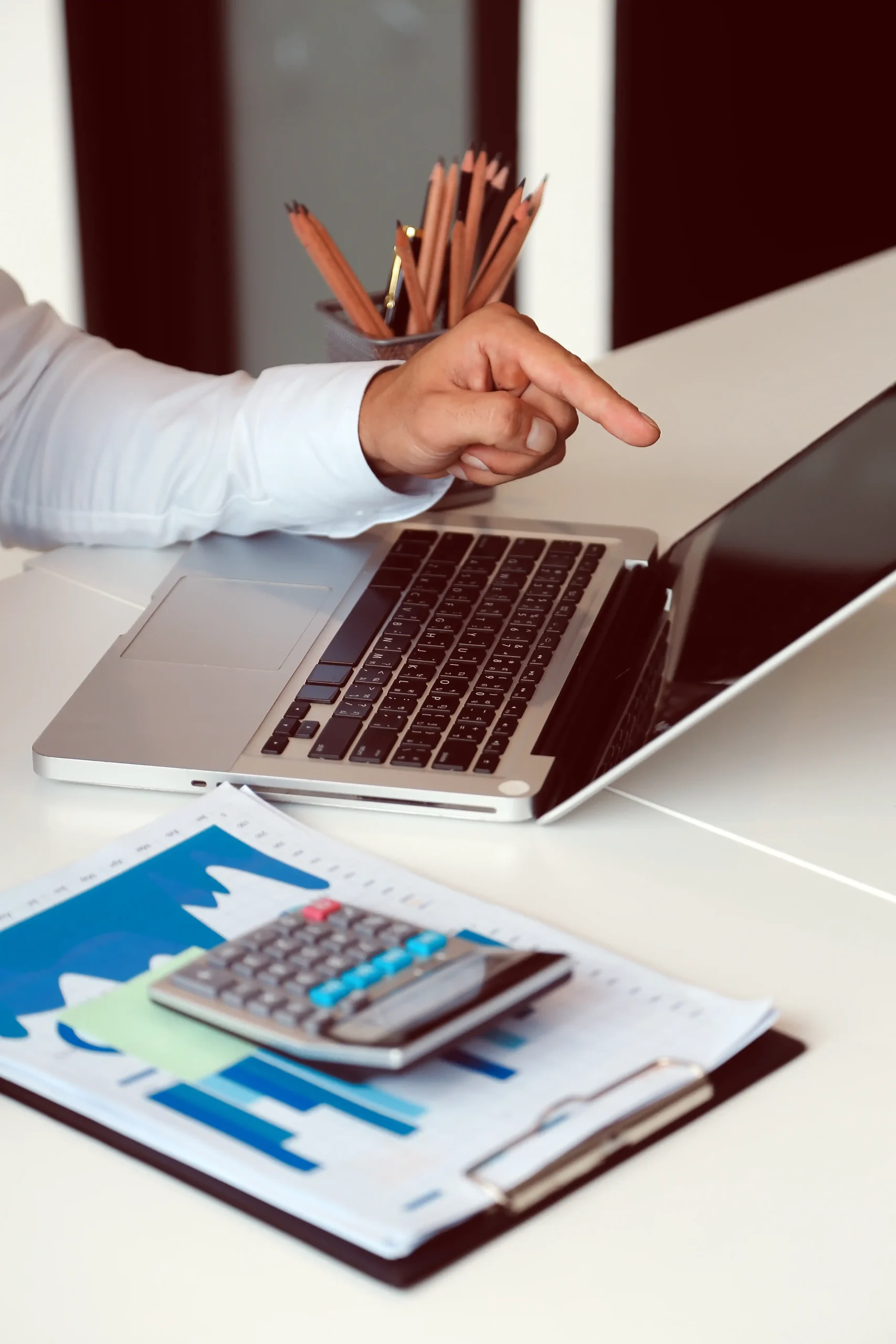 close-up-business-team-analyzing-income-charts-graphs-with-modern-laptop-computer-business-analysis-strategy-concept