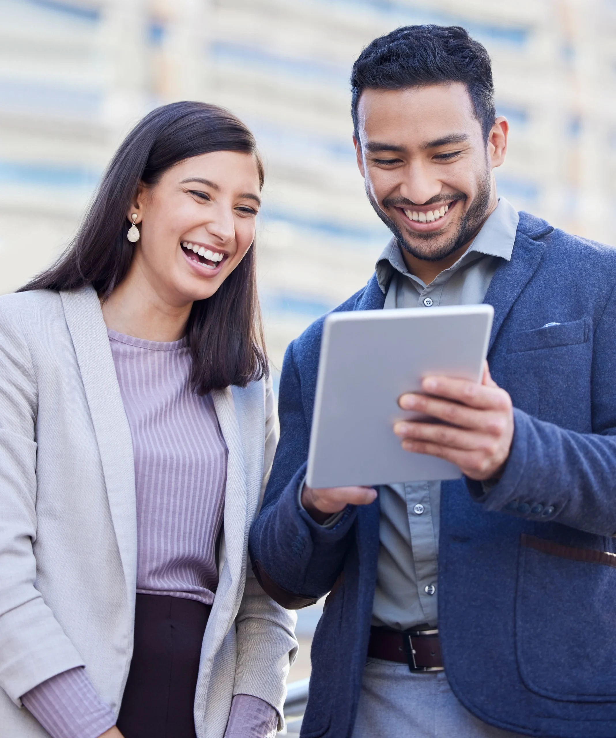 business-people-tablet-team-laughing-outdoor-city-with-internet-connection-social-media-happy-man-woman-together-urban-background-with-tech-networking-communication-app